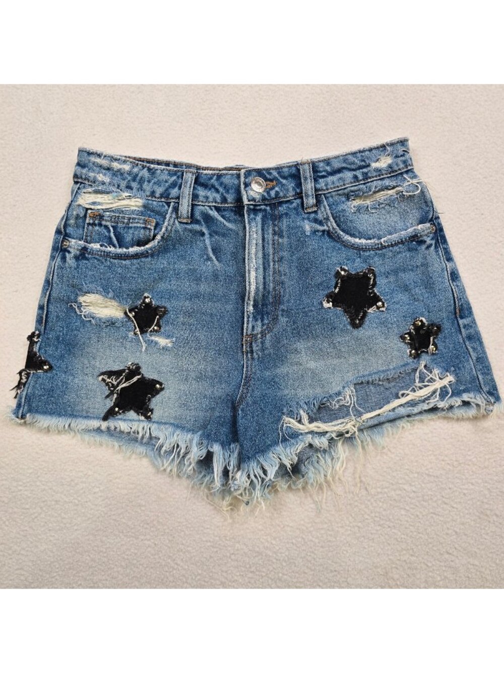 Zara Trafaluc Womens Size 4 Distressed Denim Shorts Star Patches Blue Raw Hem